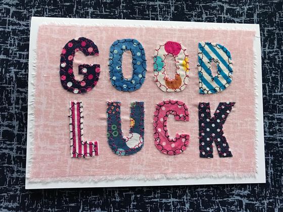 good luck card on pink