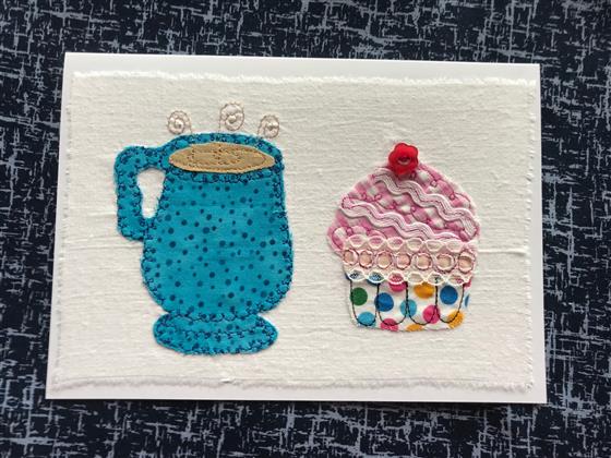 blue spotty mug and cupcake greeting card on white