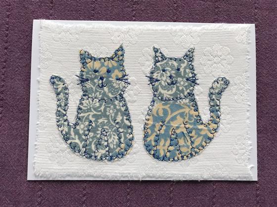 patchwork cats greeting card on white