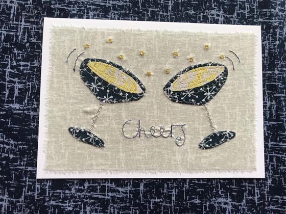 champagne glasses greeting card on grey