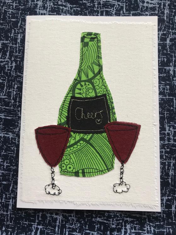 bottle of shiraz with two glasses greeting card on white