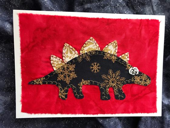 navy festive stegosaurus christmas card on red