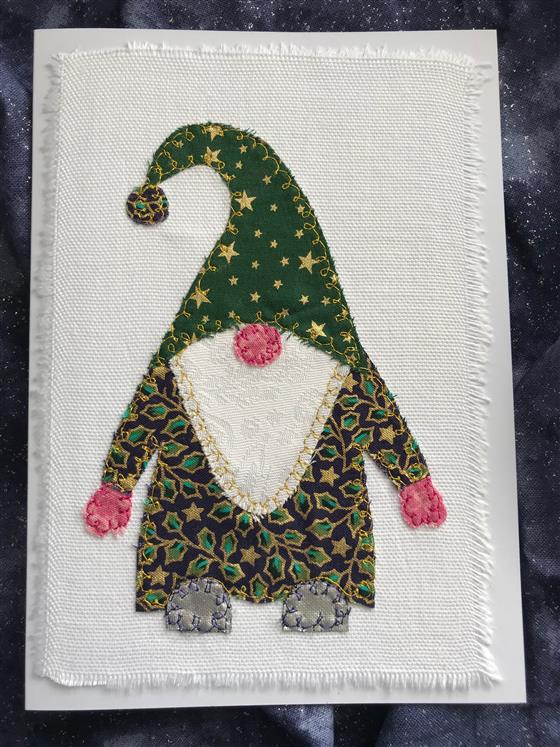 purple and green festive gnome christmas card on white