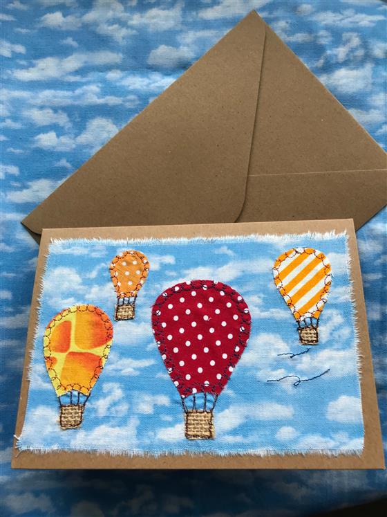 hot air balloons in red and yellow recycled greeting card