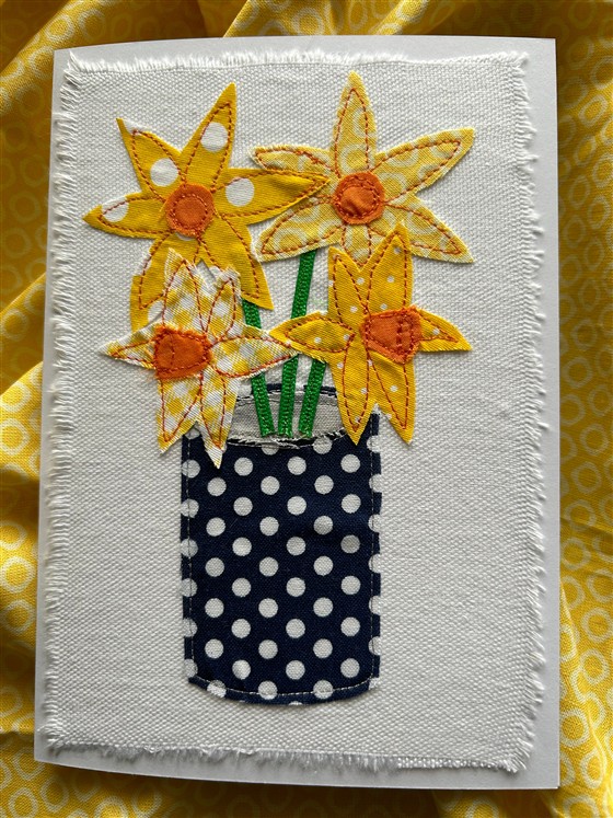 daffodils on white greeting card