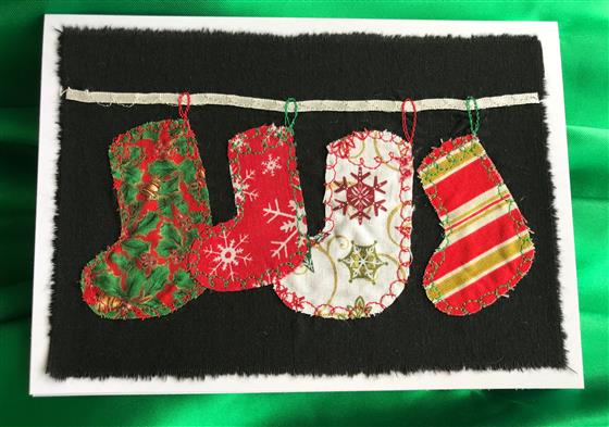 christmas stockings card on black