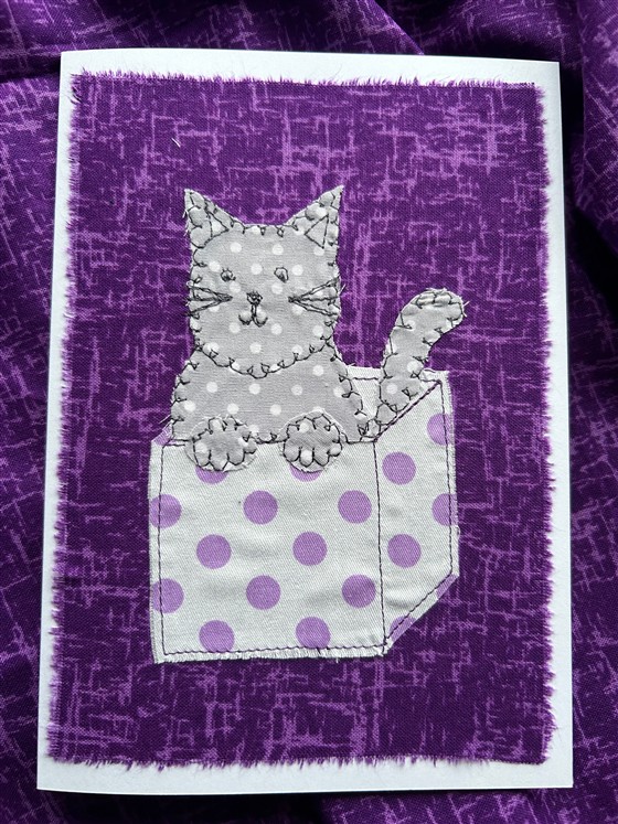 grey cat greeting card on purple
