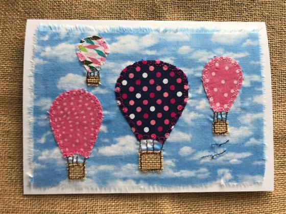 hot air balloons in pink and blue greeting card