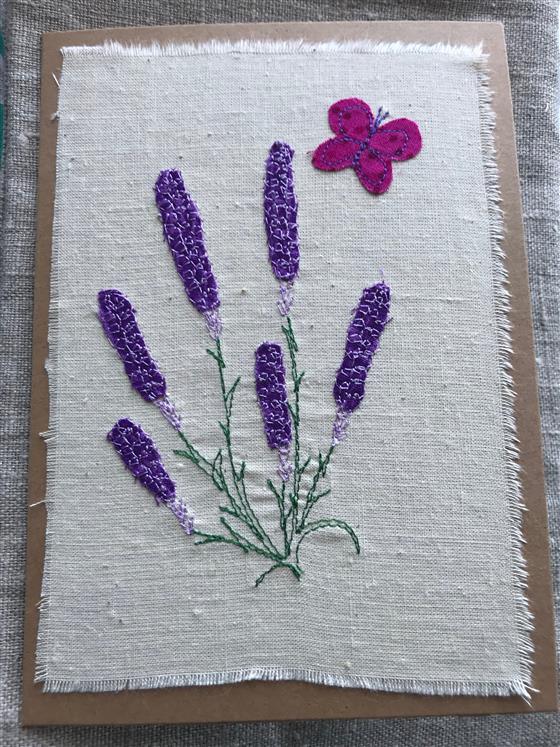 lavender greeting card on woven fabric