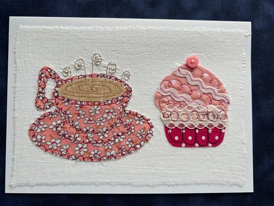pink flower tea and cupcake greeting card on white