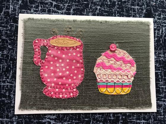 pink spotty mug and cupcake greeting card on grey