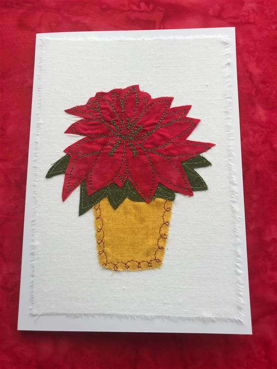 poinsettia greeting card on white