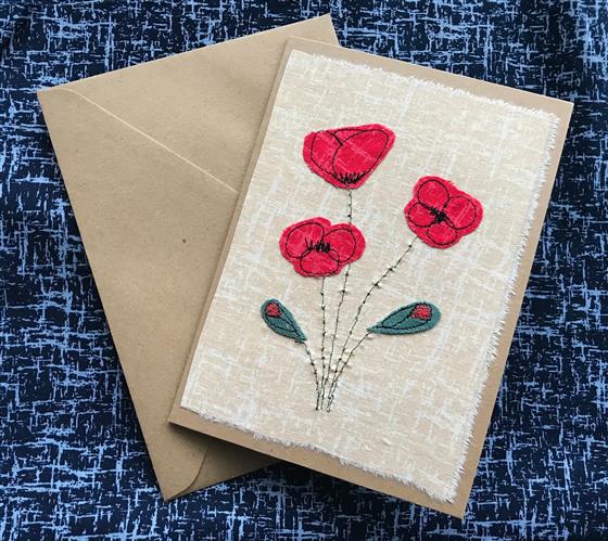 poppies card on stone