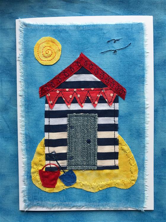 blue stripe beach hut greeting card on blue