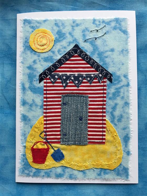 red stripe beach hut greeting card