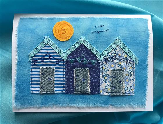 blue sky beach hut trio greeting card in blue