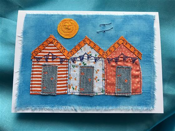 blue sky beach hut trio greeting card in orange