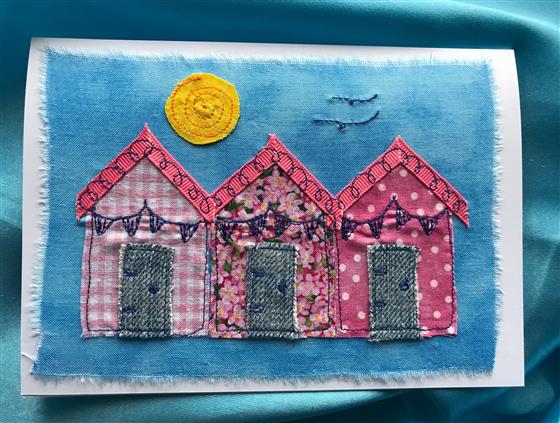 blue sky beach hut trio greeting card in pink