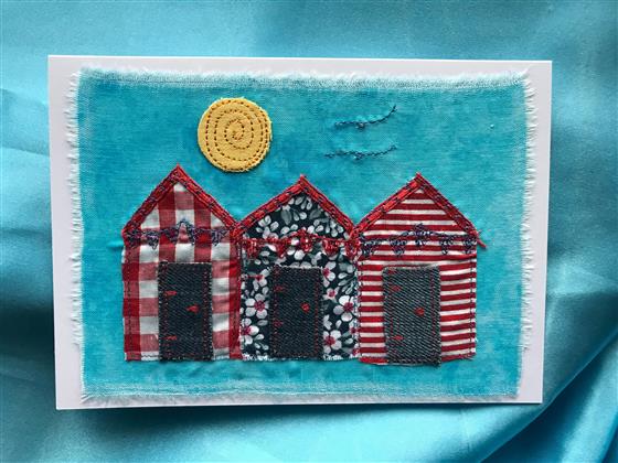 blue sky beach hut trio greeting card in red