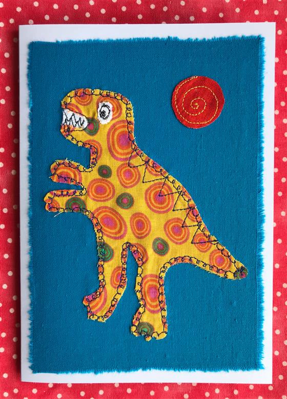 t rex dinosaur on bright blue greeting card