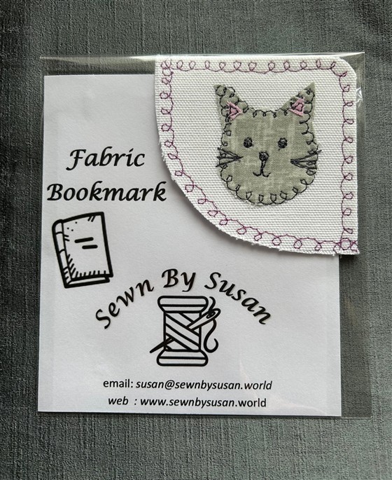 corner bookmark - grey cat on white fabric