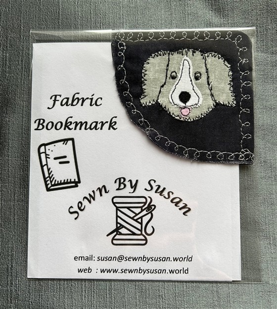 corner bookmark - grey puppy on black fabric