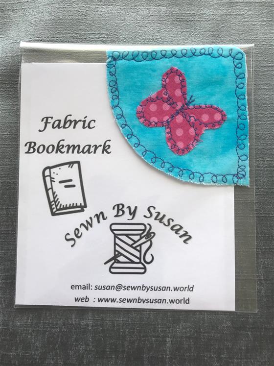 corner bookmark - pink spotty butterfly on sky blue fabric