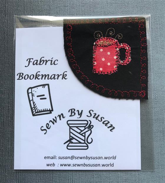 corner bookmark - red mug on black fabric