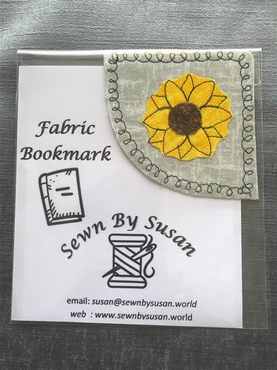 corner bookmark - sunflower on grey fabric