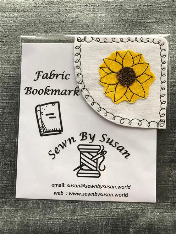 corner bookmark - sunflower on white fabric