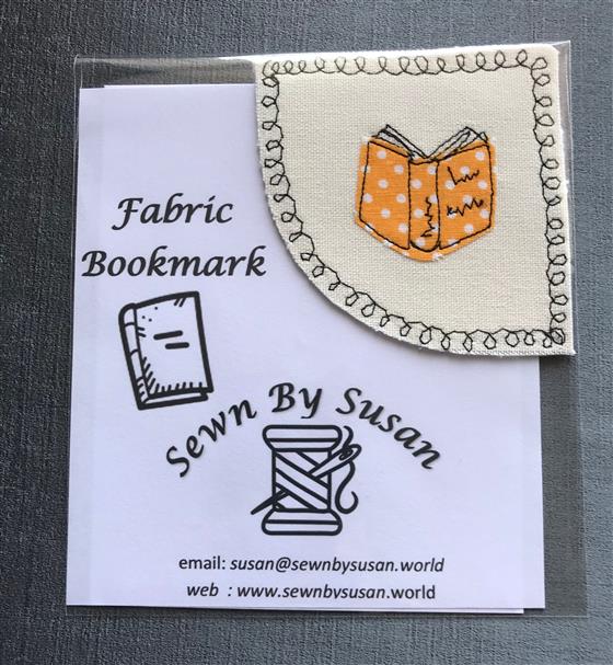 corner bookmark - yellow book on cream fabric