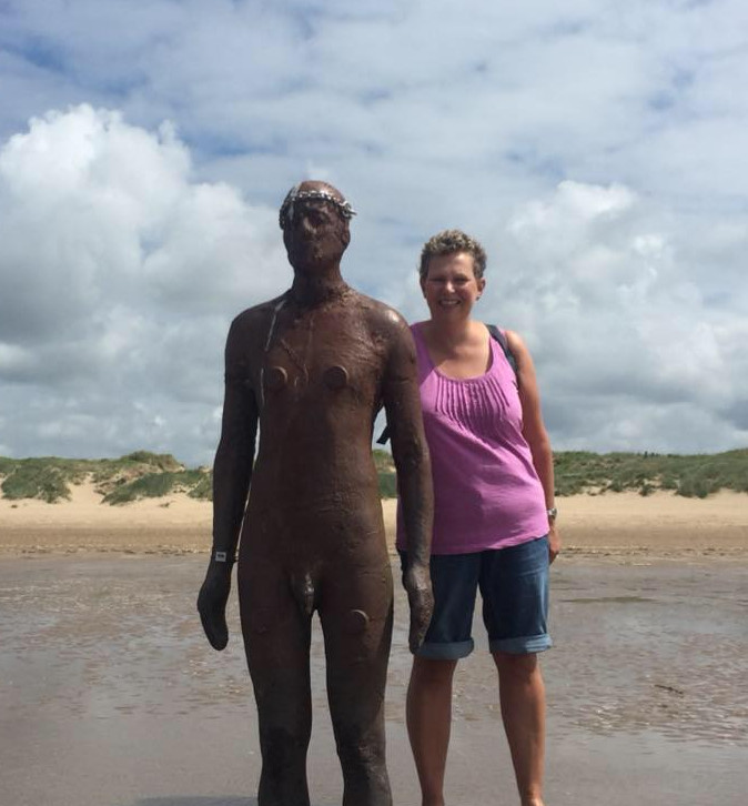 Susan on Crosby beach, near Liverpool -'Another Place' by Antony Gormley